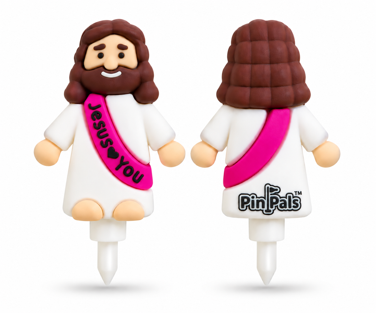 Two small Jesus figurines shown front and back on a white background. The front figure has brown hair and beard, a white robe, and a bright pink sash that reads “Jesus ♥ You.